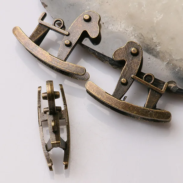 

20pcs antiqued bronze color simple rocking horse design charms EF3386