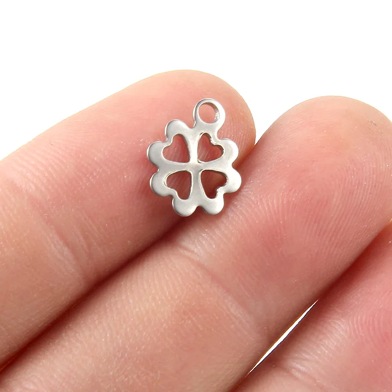

20pcs/lot sweet hollow lucky clover fashion earrings bracelet small pendants for DIY jewelry making