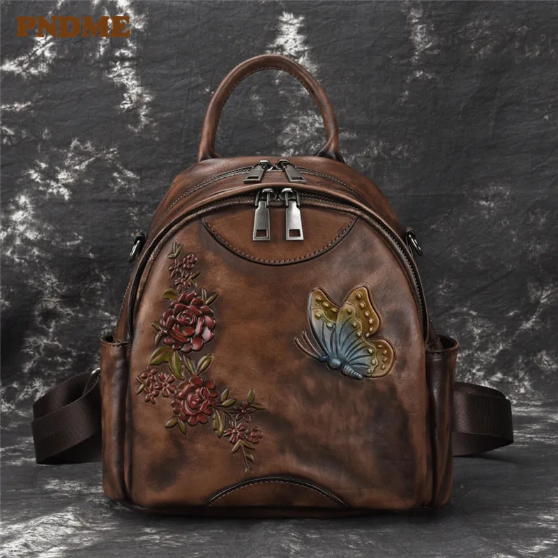 

PNDME high quality vintage handmade embossed first layer cowhide ladies backpack genuine leather small women bookbag bagpacks