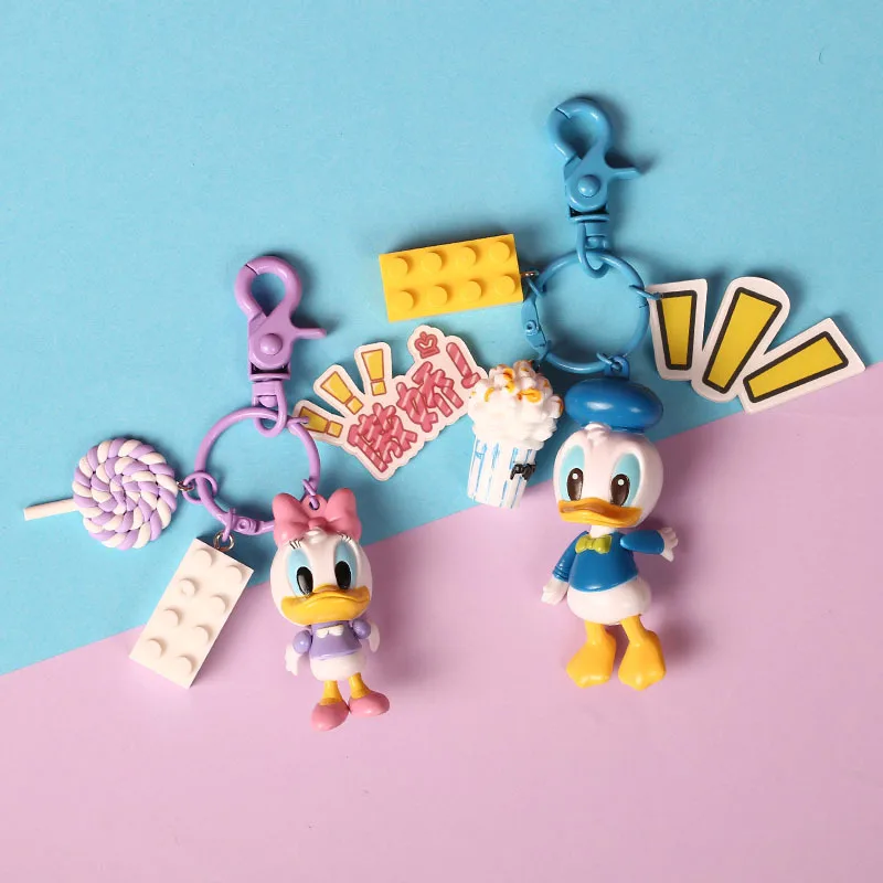 

Donald Duck Daisy Cartoon Movies Series Action PVC Figures Keychain Kid Toys Doll Keyrings Holder for Women Bag Charms Jewelry