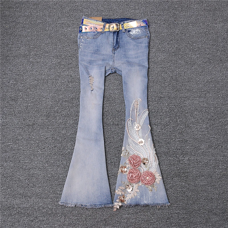 

2018 summer and autumn new thin section old worn out elastic three-dimensional flower horn jeans female nine points