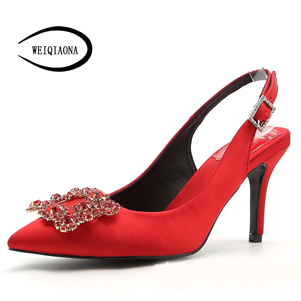 pointed buckle heels