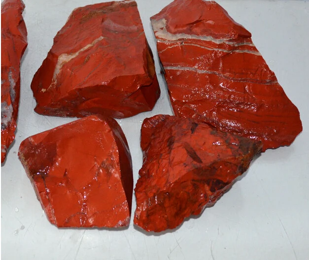 красный жадеит. красный императорский нефрит. нефрит красный натуральный. красный нефрит камень. красный нефрит камень.