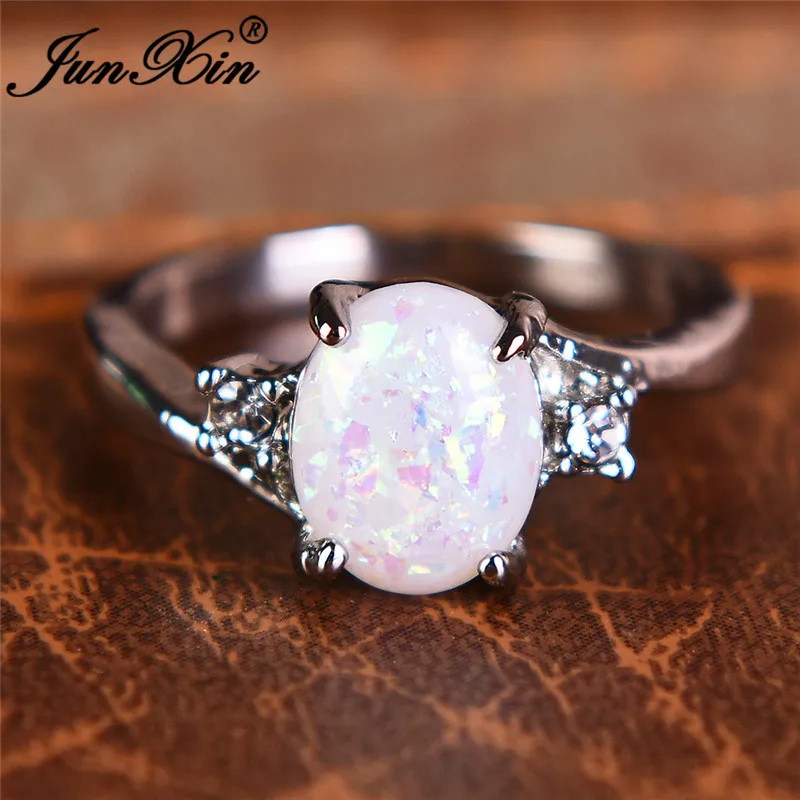 

JUNXIN Wholesale Rainbow Fire Opal Rings For Women 925 Sterling Silver Filled Oval White/Blue/Purple Opals Wedding Ring Crystal