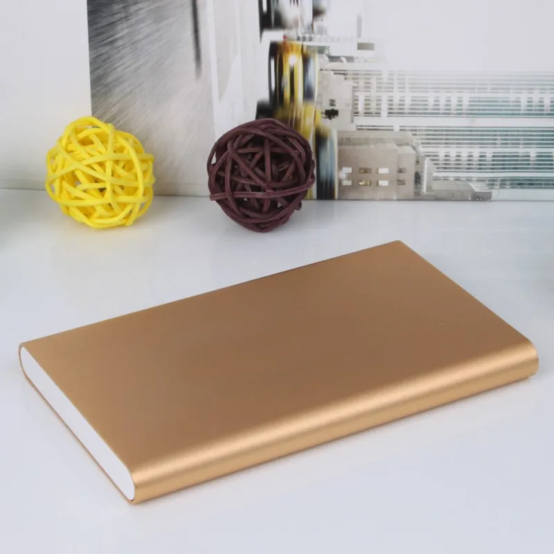New arrival Ultrathin 12000 mAh Portable USB Battery Charger Power Bank For Iphone Smart Cell Phones Includes a charging cable