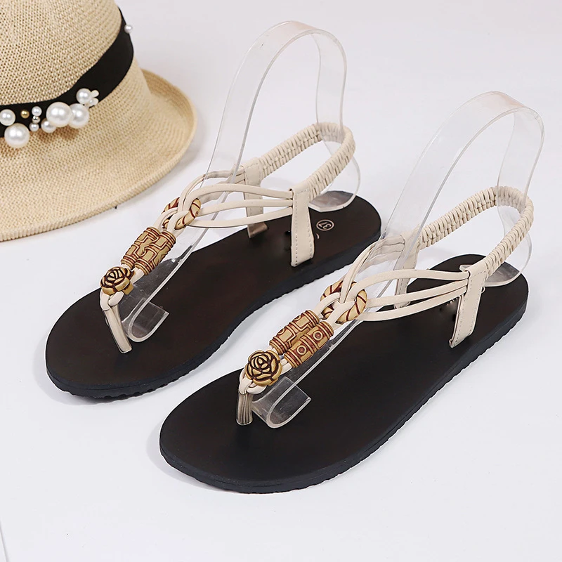 

Female Sandals 2019 New Sandals Female bohemian wind beads elastic with human word dragging toe foreign trade beach shoes