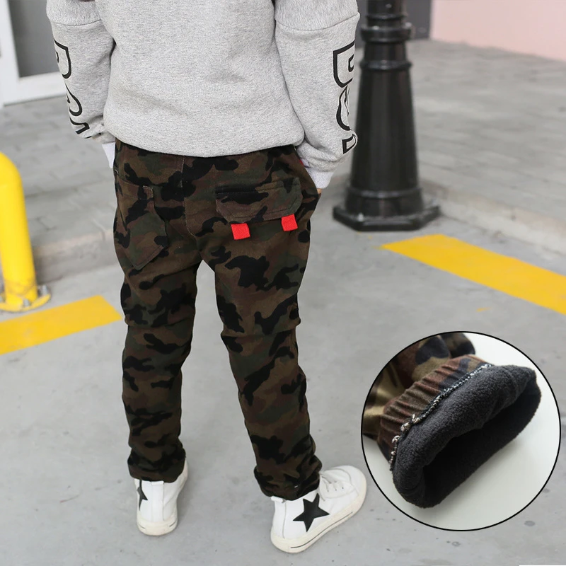 camouflage pants with red stripe