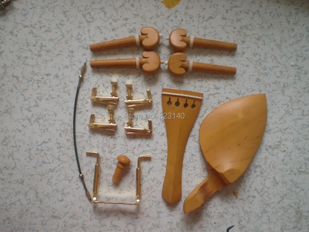 

1 Set BOXWOOD Violin fitting with Gold Fine tuner,tail gut, Gold Chin rest screw all 4/4