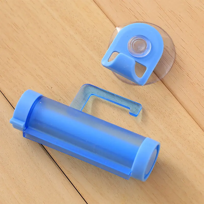 Rolling Toothpaste Dispenser Tube Squeezer Plastic Sucker Hanging Holder Home Dental Cream Bathroom Manual Syringe Gun Dispenser