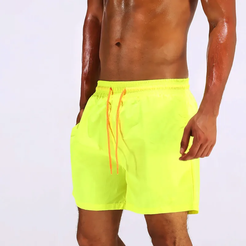 UMLIFE Swim Trunks Men Breathable Sport Swimming Shorts Solid Color Swim Briefs Elastic Waist Beach Shorts Summer Swim Shorts  (4)