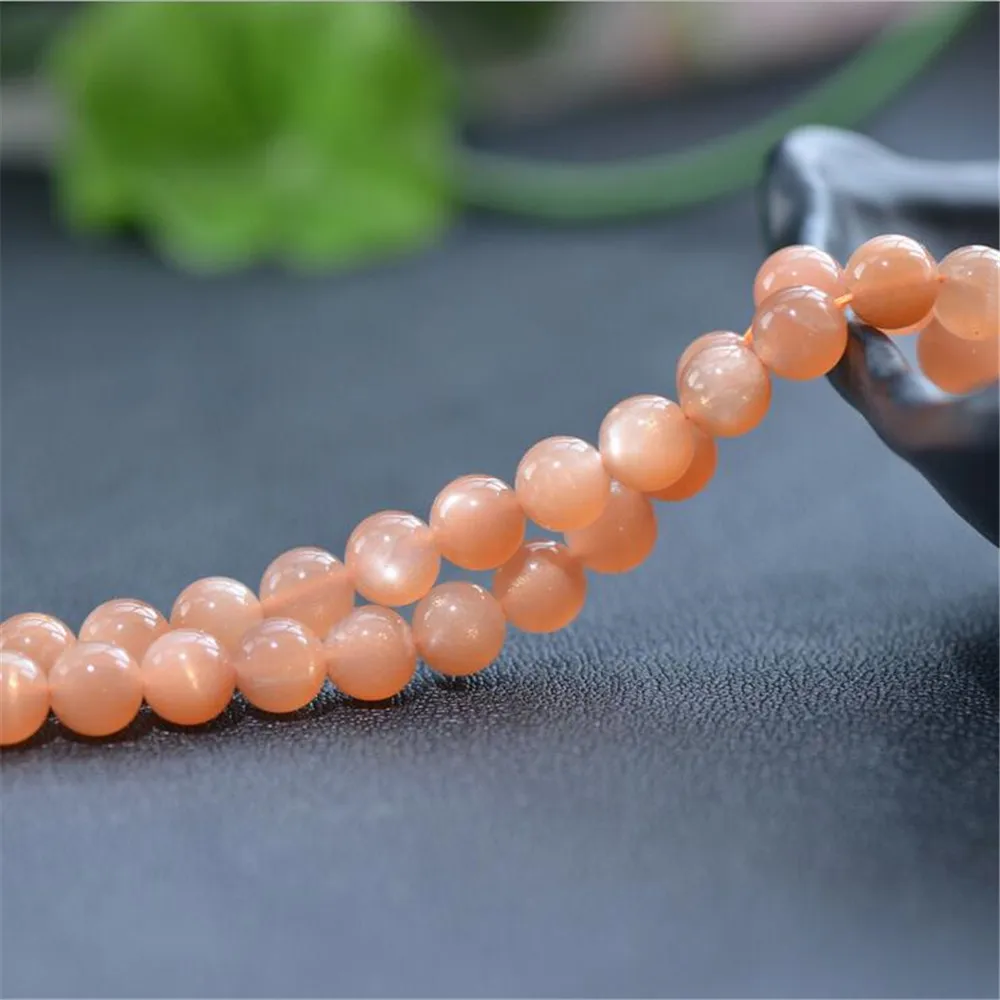 

Joanlyn Grade AA Natural Orange Moonstone Beads Golden Flash Sunstone Beads 4mm-11mm Smooth Polished Round 15 Inch Strand MD31