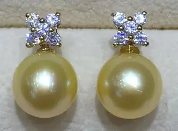 

AAA 10-11 mm round natural south sea gold pearl earrings 14 K yellow gold