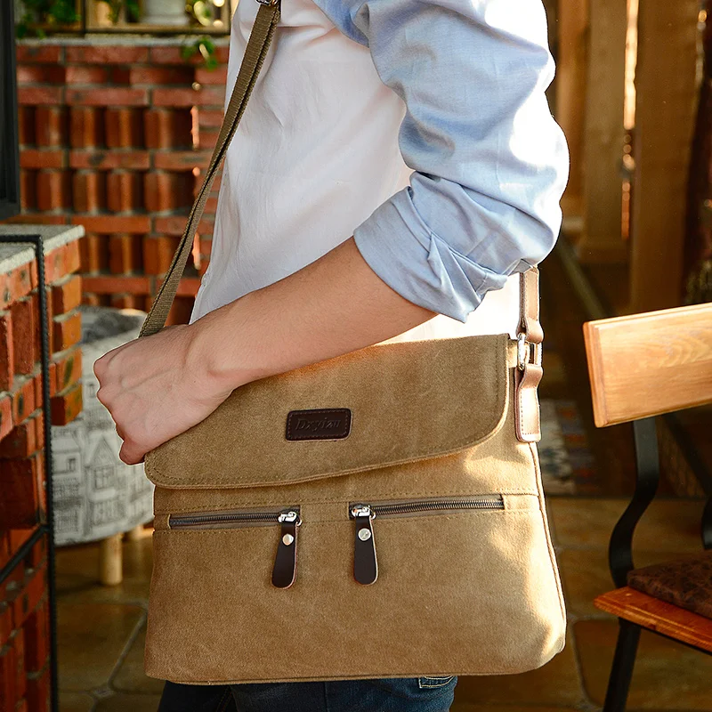 Men 's canvas shoulder bag multi - functional men' s travel leisure diagonal package solid color zipper handbag packaging