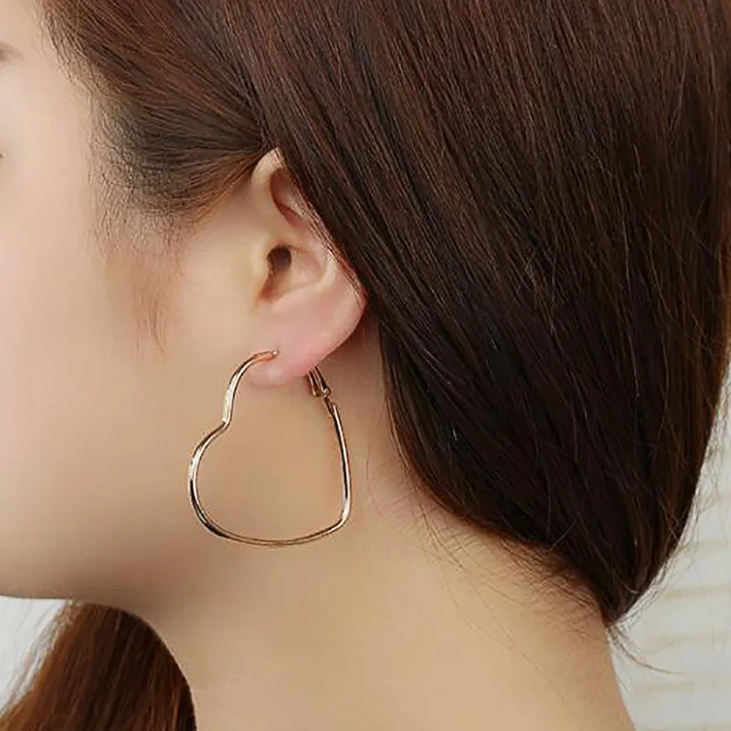 

New Fashion Hollow Peach Heart Earring Metal Plating Ornaments Simple Dangle Earrings For Women Copper Brincos Jewelry jn518