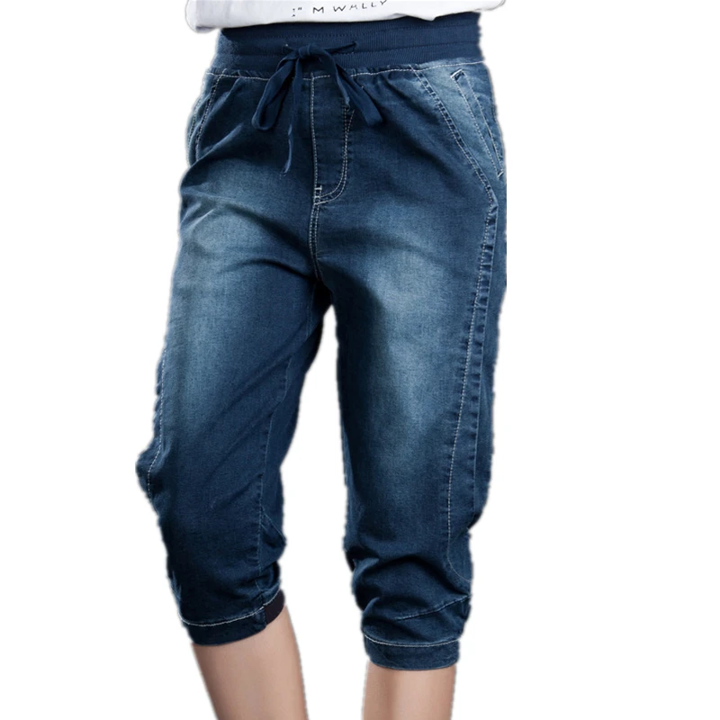 Summer Capris Jeans Stretch Plus Size Breeches Female Harem Denim Pants Elastic Wasit Loose 5XL Knee Length Mom Jeans Women Summer Capris Jeans Stretch Plus Size Breeches Female Harem Denim Pants Elastic Wasit Loose 5XL Knee Length Mom Jeans Women