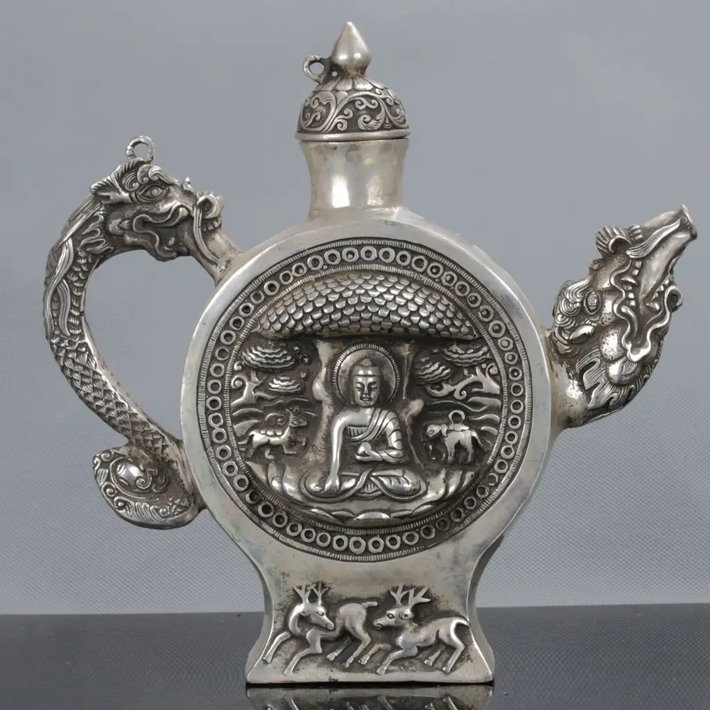 

Old Miao Silver Hand Carved Buddha & Dragon Teapot Xuande Mark