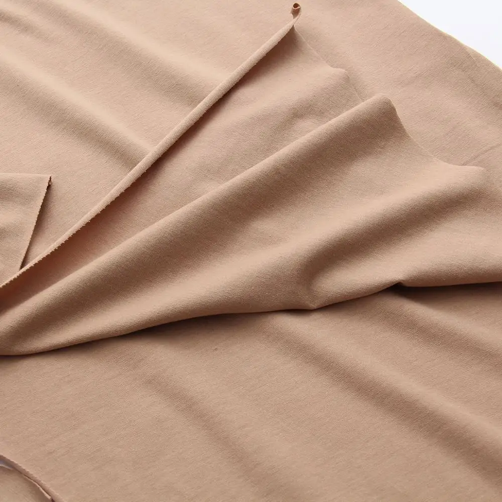 Женские свободные хлопковые футболки асимметричного кроя однотонные с круглым