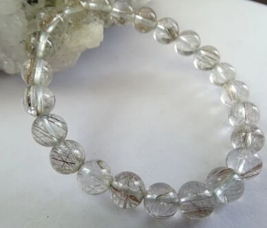 

001987 natural genuine rutilated quartz rock round stretch bracelet