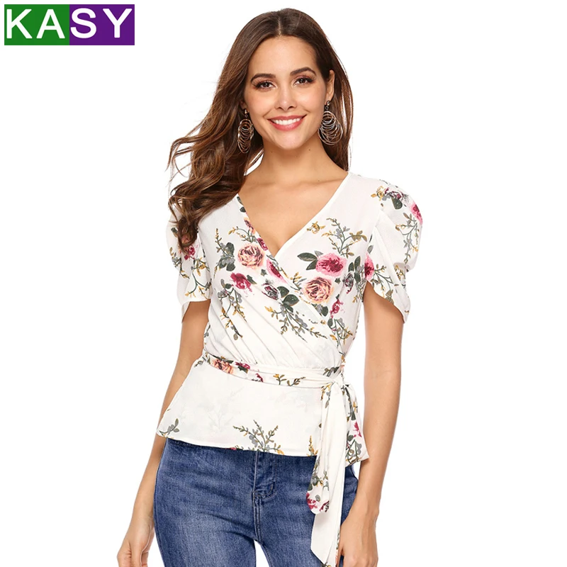 

Sexy Low V neck White Floral Summer Chiffon Blouses 2019 Women Short Sleeve Belted Boho Flowy Shirts XL Tunic Tops Puff Sleeve