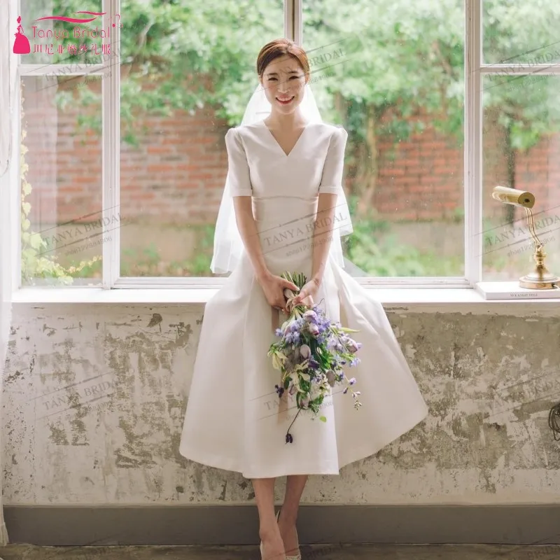 

Country Korea Style A Line V Neck Wedding Dresses Short Sleeves Open Back Tea Length Bridal Gown Cheap Vestidos De Noiva DQG357