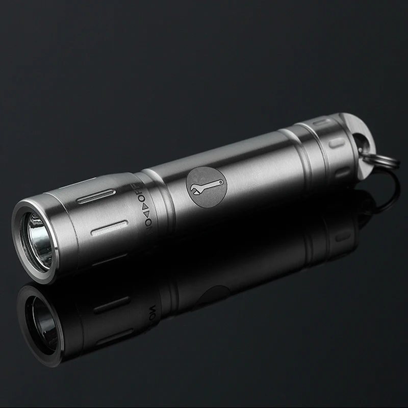 

Outdoor high-quality Rotary switch stainless steel glare portable light mini LED flashlight AAA EDC key hanging