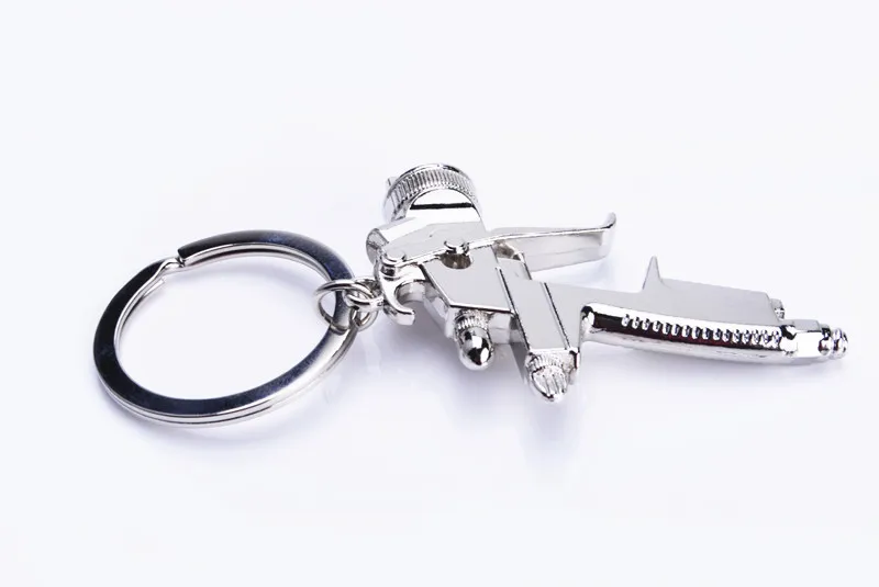 Water Spray Gun Keychain Metal Men Gift Car Key Chain Motorcycle Auto Accessories Creative Key Ring Water gun Key Cover Holder