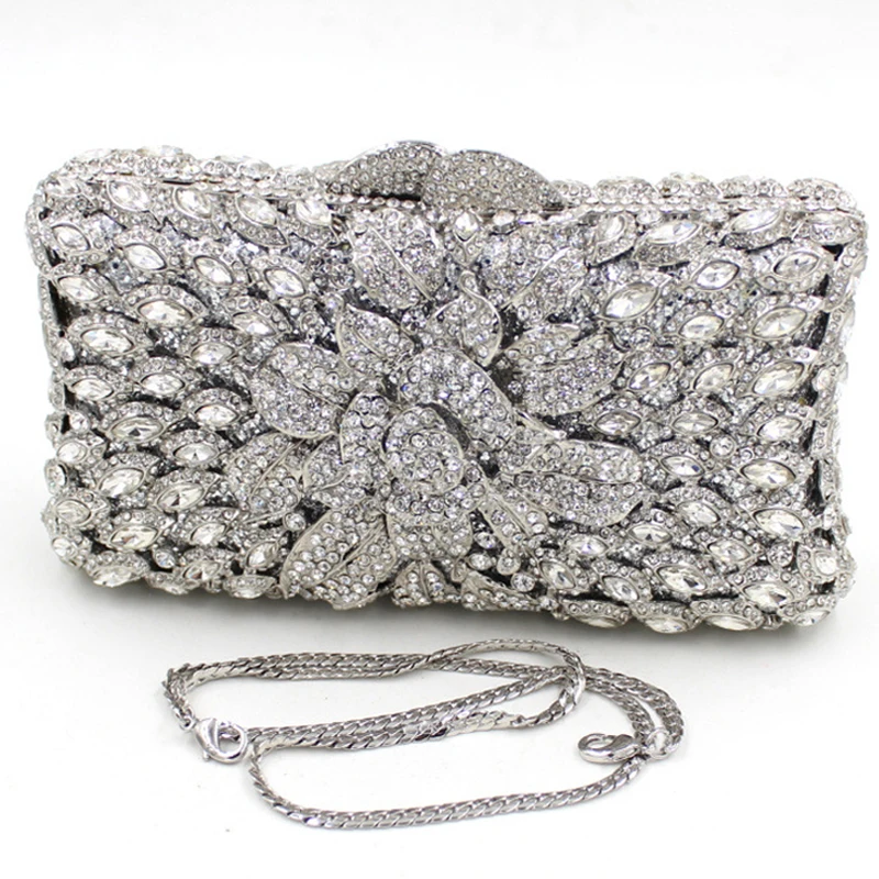 white and silver clutch bag