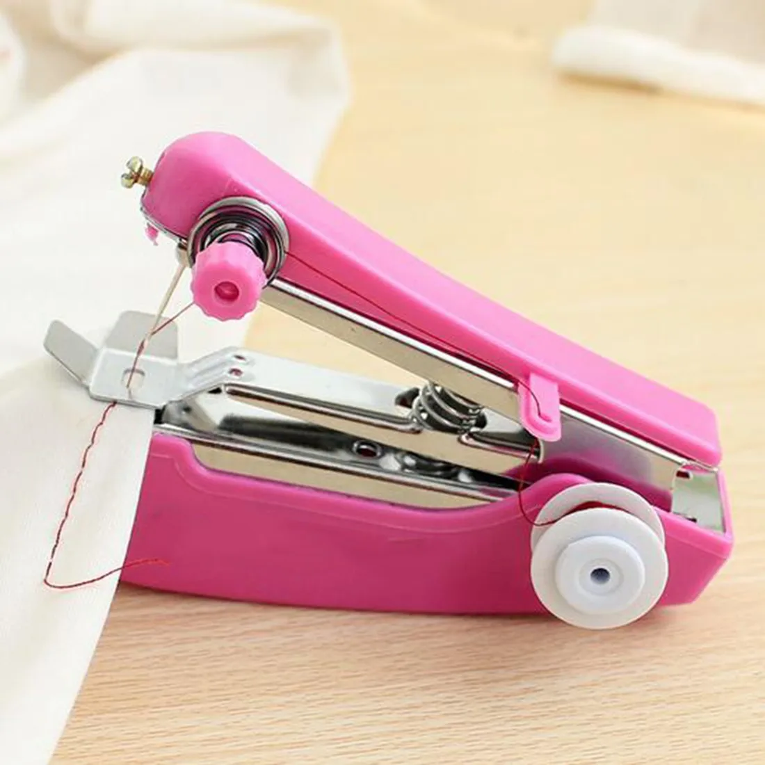  New 1Pcs Portable Needlework Cordless Mini Hand-Held Clothes Fabrics Sewing Machine