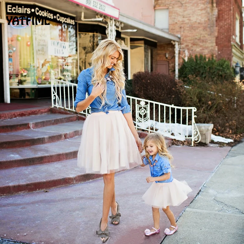 couple mom and kid dress