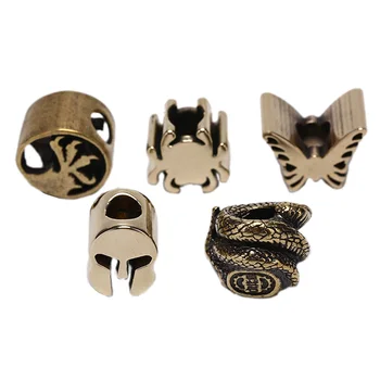 

Paracord 1PC Outdoor Vintage Skull Brass Knife Beads Shield Umbrella Rope Lanyard CrossBead Wholesale