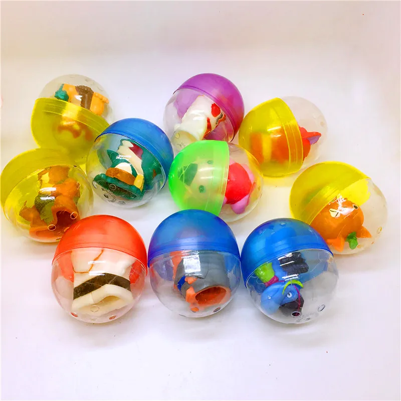 

10pc/lot 47mm*55mm ellipse plastic color balls capsules toys with inside different cute small dolls for vending machine