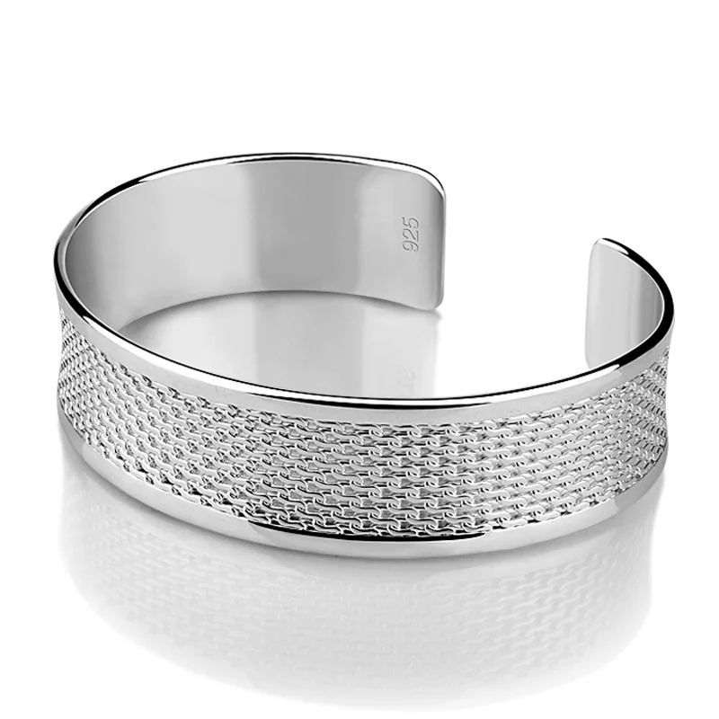 

Fashion 15 mm wide silver bracelet. Solid 925 silver bracelet woman.Adjustable size of the bracelet.Lady silver jewellery