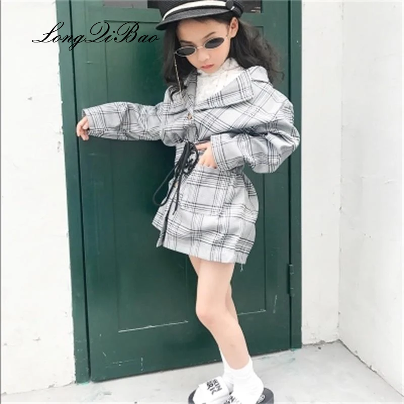 

Girls windbreaker 2018 autumn new big children's children's long section suit collar lattice belt waist Korean version of the ti