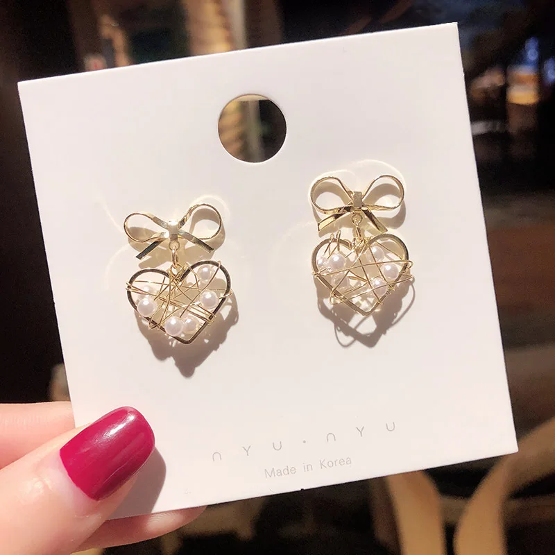 

2019 New Korean Fashion Elegant Butterfly Knot Hollow Loving Earrings Female Pearl Long-style Liusu Baitao Ear Jewelry