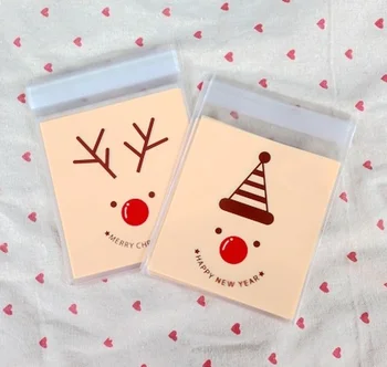 

Ferimo 100pcs Christmas bag from OPP bag Christmas cute elk head self adhesive candy biscuit storage bags