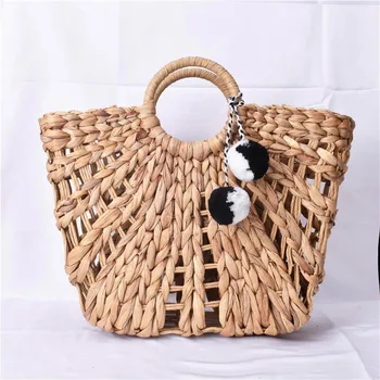 

2019 new corn husk woven bag female summer holiday straw bag Women rattan Net Bag Vintage Chic handbag Hollow Grass bag