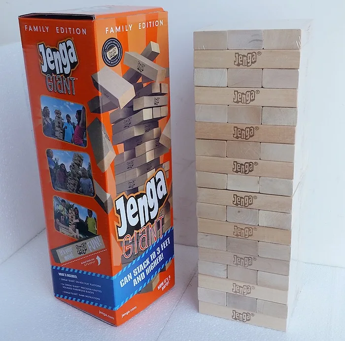 giant jenga game with giant wood blocks and dice