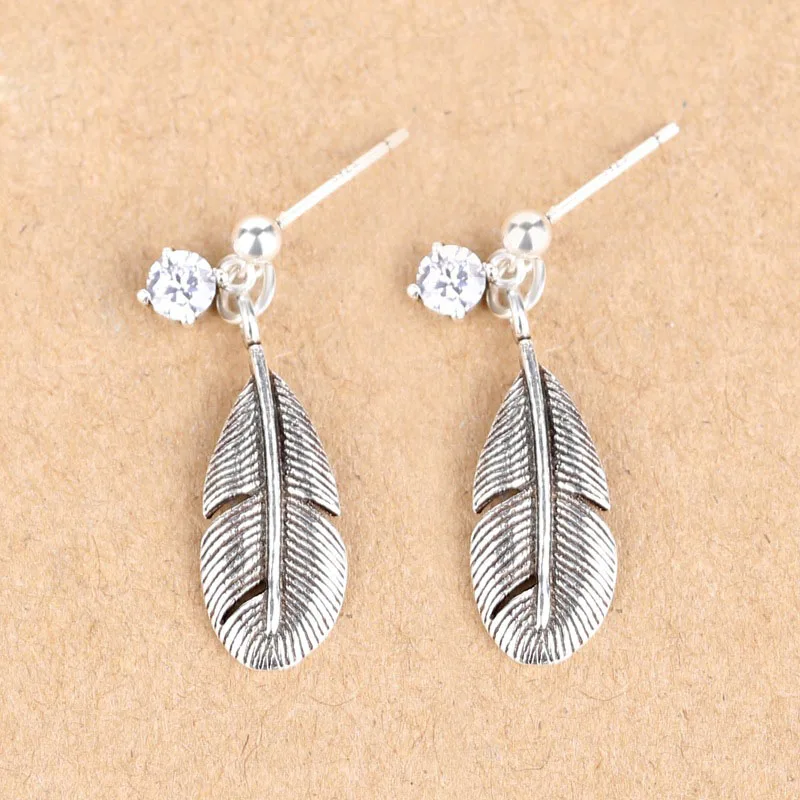 

Office Feather CZ 925 Sterling Silver Dangling Earrings