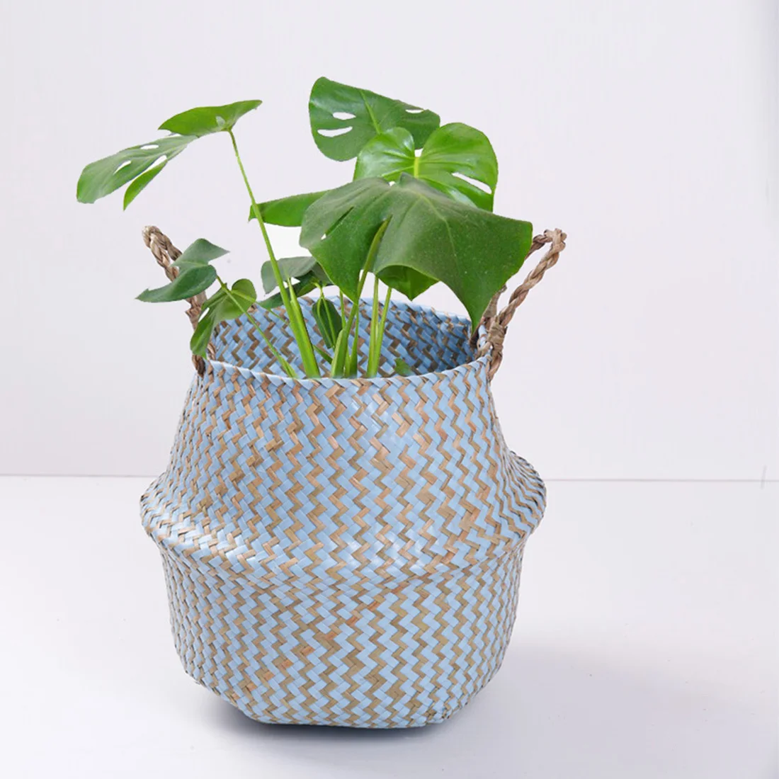 

Creative Woven Flower Basket Blanket Seagrass Basket Folding Belly Basket with Straw Handles -Natural Color + White Wave Pattern