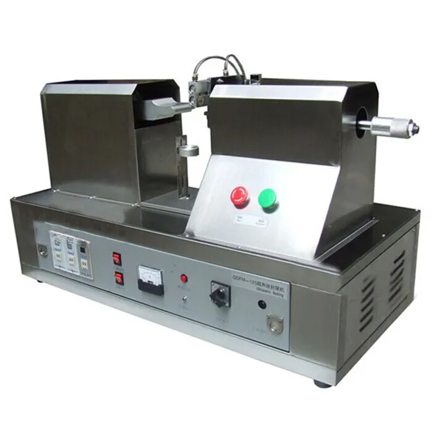 

Plastic tube sealing machine with date coder