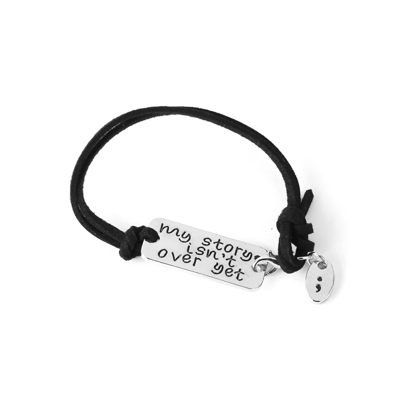 

Hand Stamped My Story Isn't Over Yet Motivational Quote Leather Bracelet Set with Charm