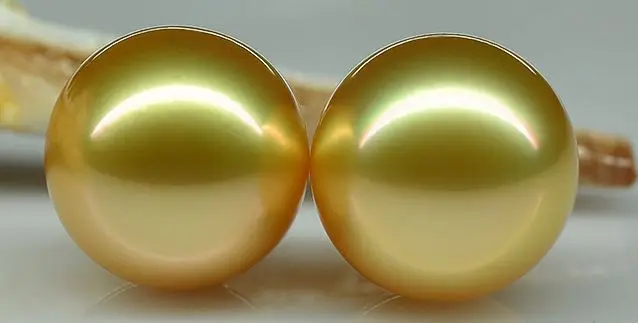 

AAApair of 10-11MM SOUTH SEA GOLD LOOSE PEARL HALF DRILLED