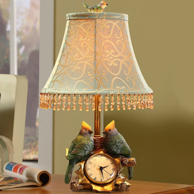 

European style resin table lamp clock bedroom bedside lamp simple modern bird garden fashion warm bedroom table light ZA99526