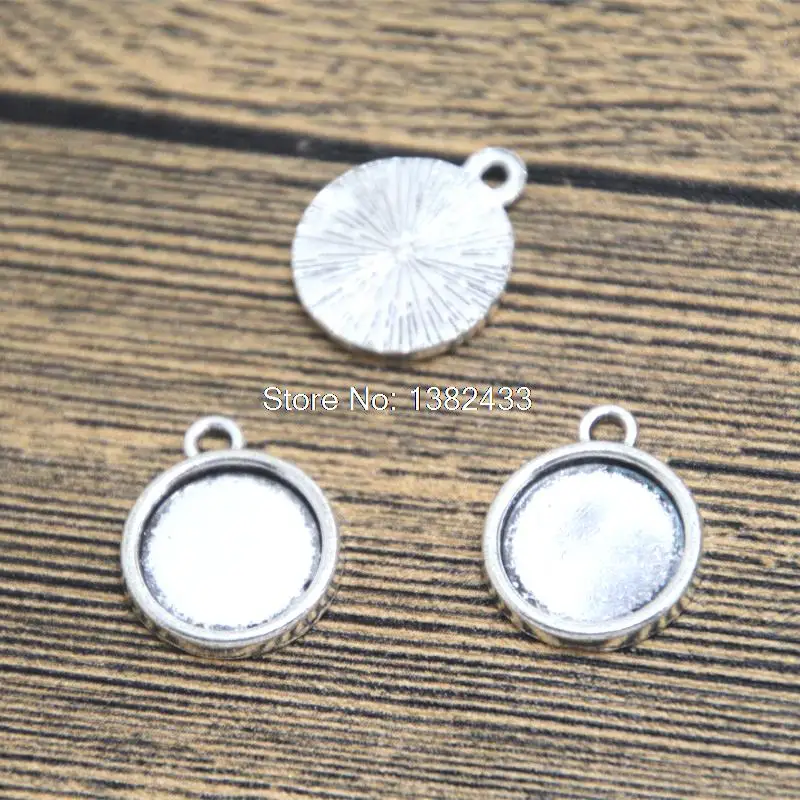 

20pcs silver tone round Glass Cabochon settings pendants fit 12mm glass dome