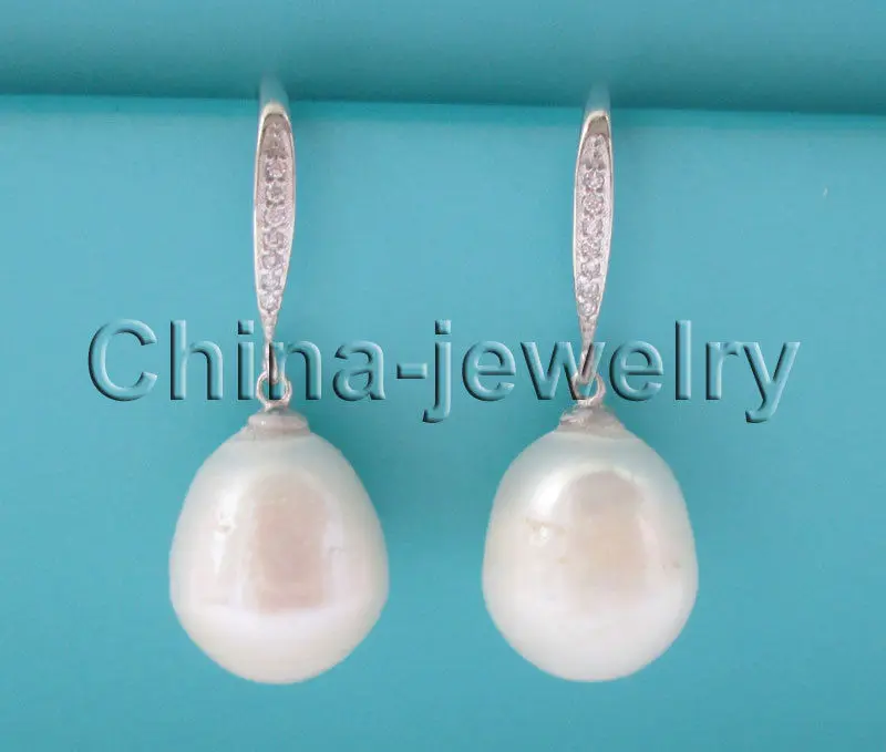

Free Shipping >>>>14mm natural white baroque rice shape freshwater pearl earring - silver hook