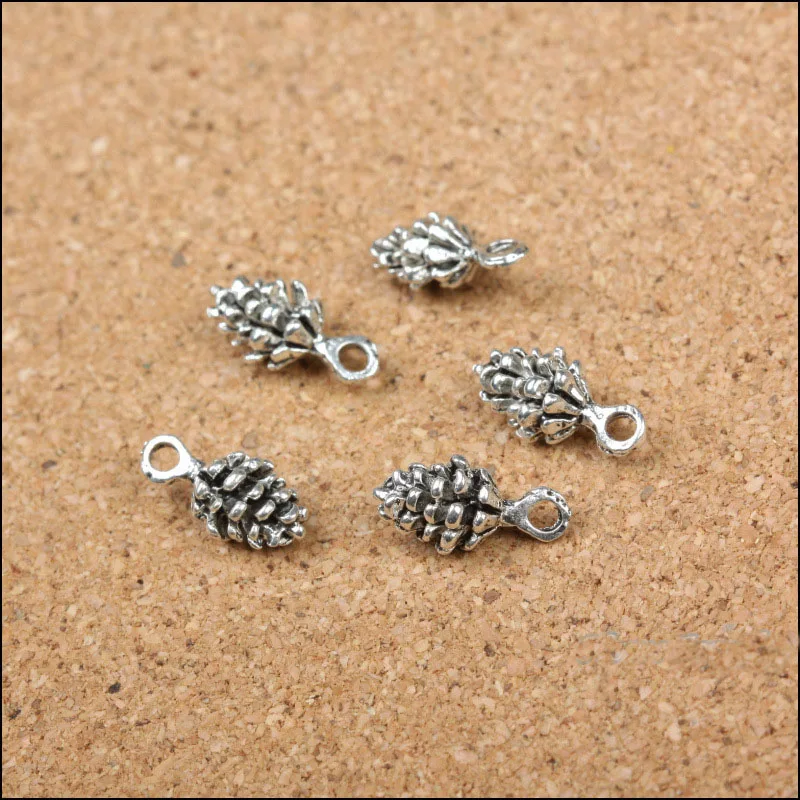 

Factory Price 12 Pieces/Lot 14mm*7mm Antique Silver Plated metal charm pine cone charm tree charms For Jewelry Making