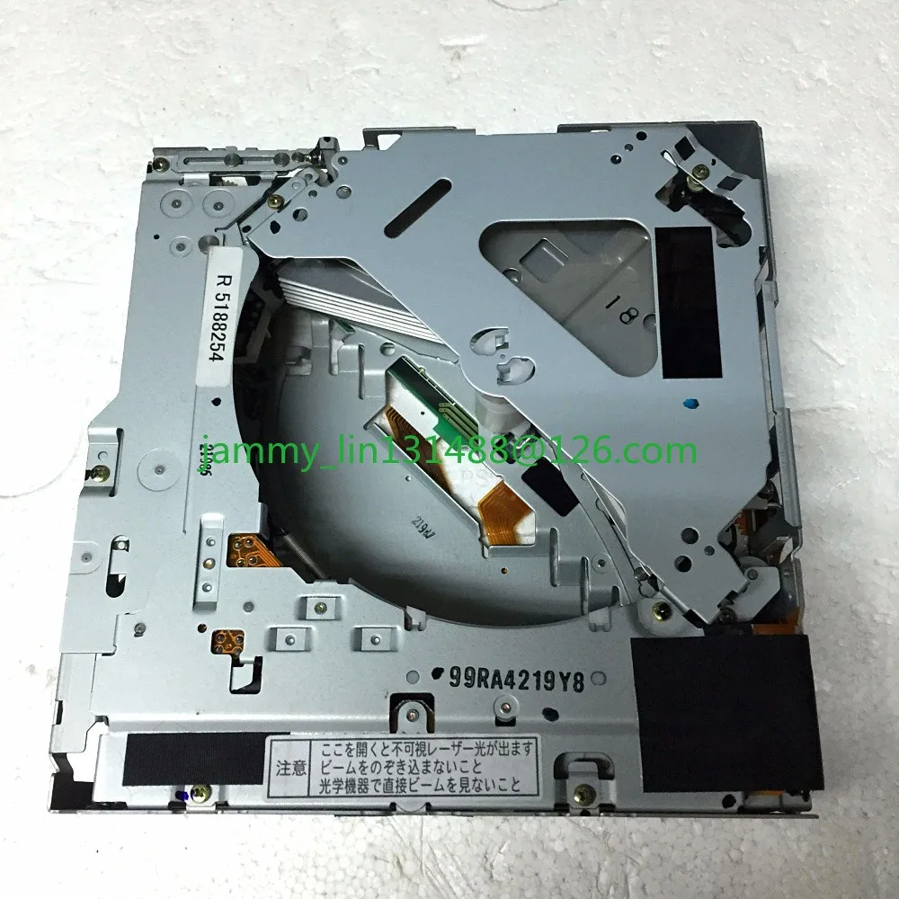 Matsushita 6 disc CD changer mechanism with black connectors.