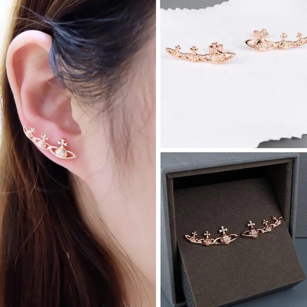 

XIAOJINGLING CZ Crystal Saturn Planets Connected In Row Punk Rock Unisex Ear Studs Earrings Pin Stud Earring Women Jewelry Gifts