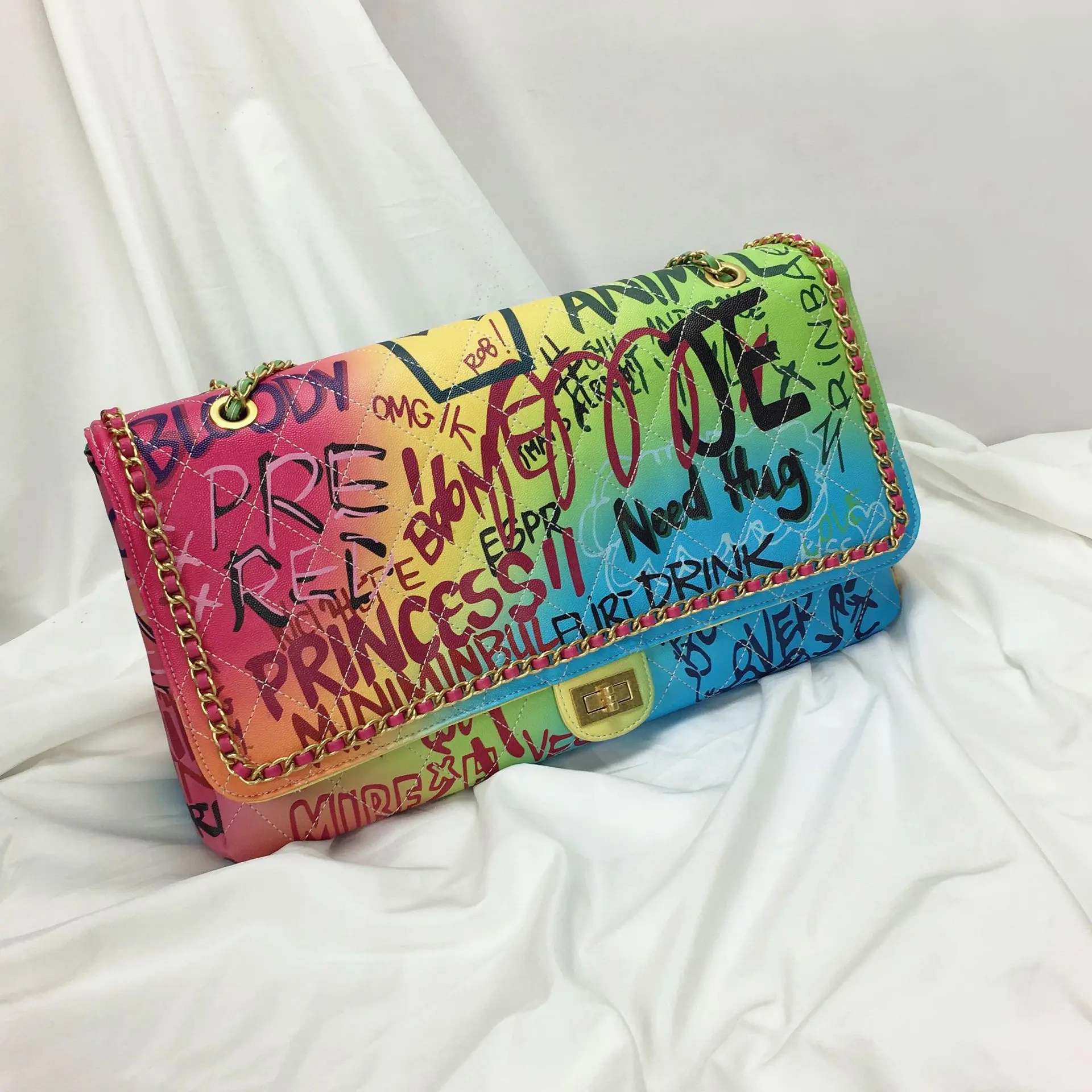 

Luxury handbag 2019 new fashion colorful graffiti grid.Large capacity single shoulder chain bag for women