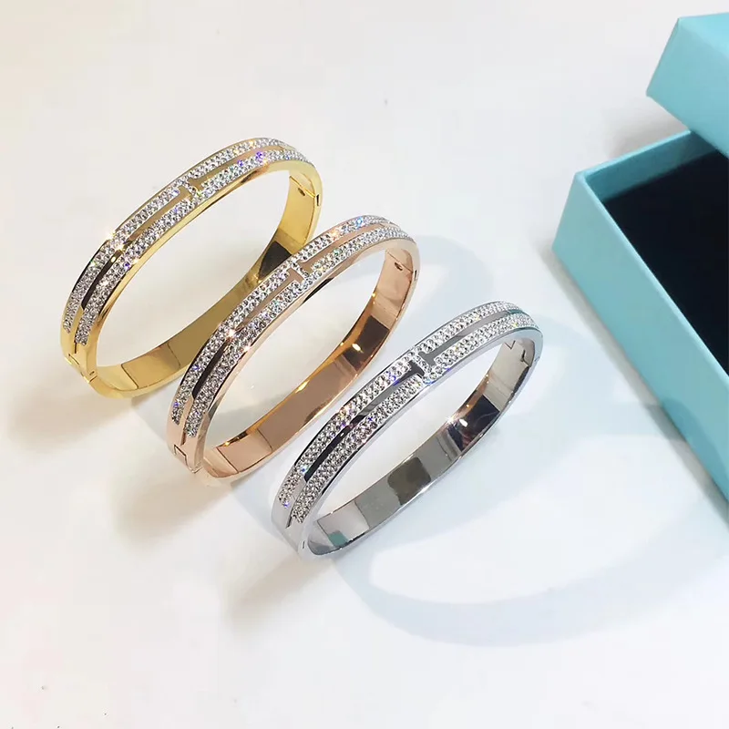 

Fashion hot-selling titanium steel jewelry style stick rhinestone double T line titanium steel buckle bracelet